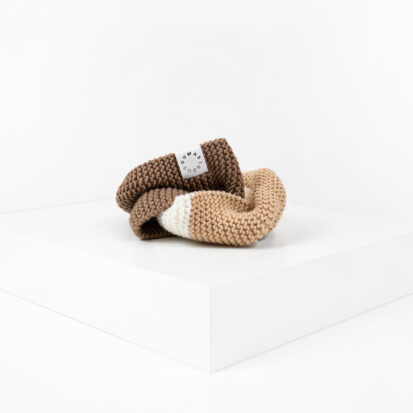 Cafe Latte Hand knitted snood for dogs depicted in white studio.