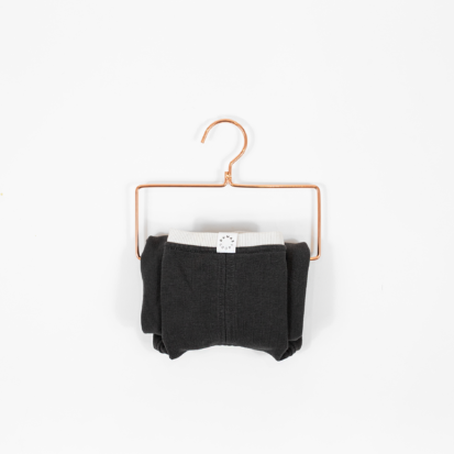 Cozy Waistcoat in color of Grey Espresso with white finish displayed on a hanger.