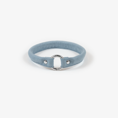blue round microfiber house collar with a stainless steel opening ring at the middle of the collar.
