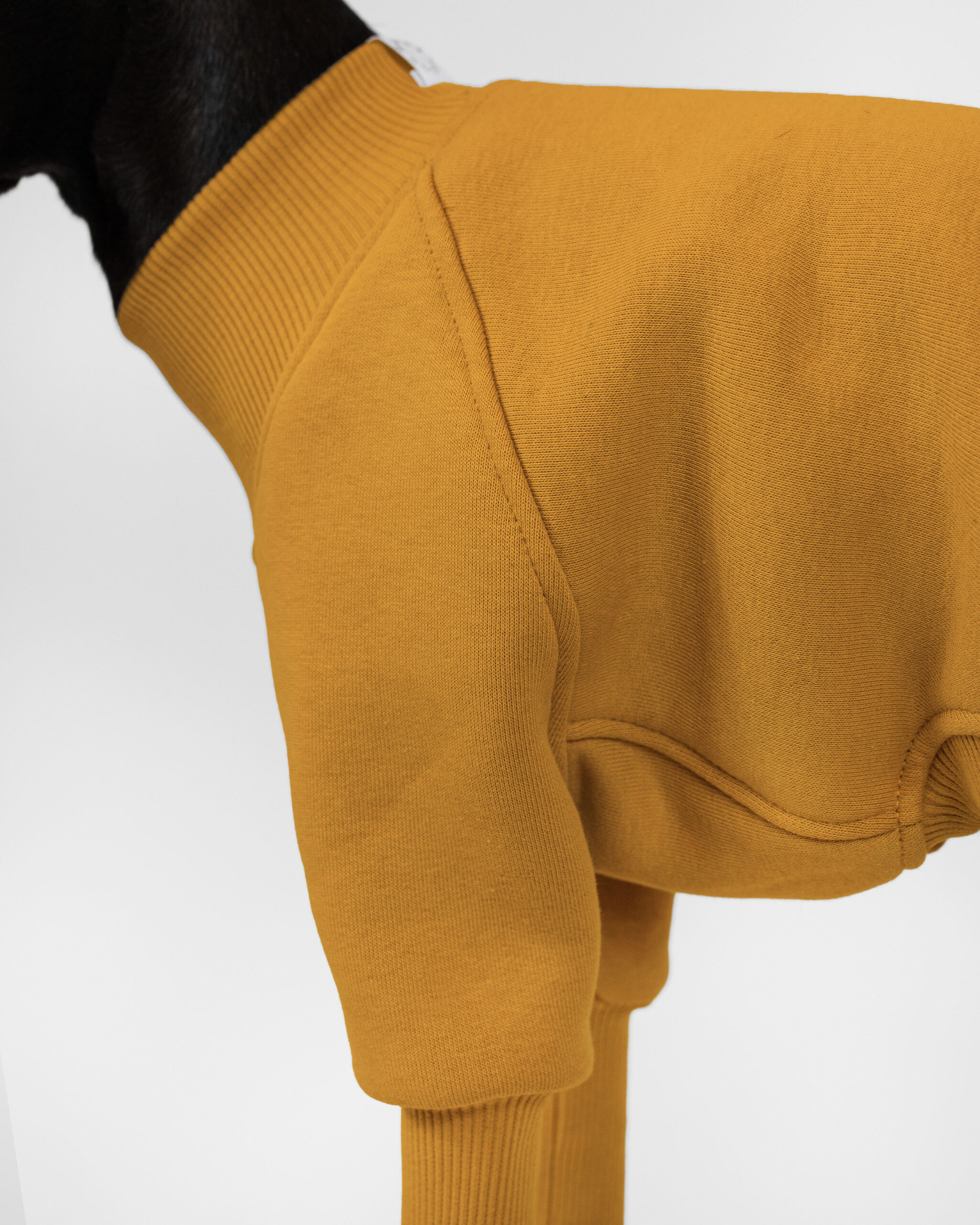DumasGoods-Soft-Core-Jumper-amber-detail-italian-greyhound-clothing close up of soft core jumper shoulder area in color amber