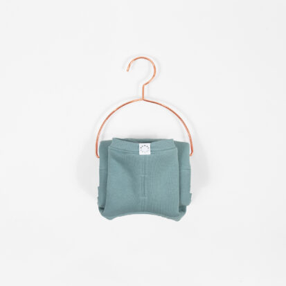 Cozy Waistcoat in color of Iceberg displayed on a hanger.